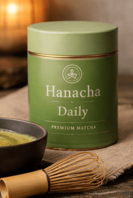Hanacha Daily tin beside a whisked bowl of matcha